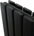 close view of a black horizontal designer radiator with flat panels 